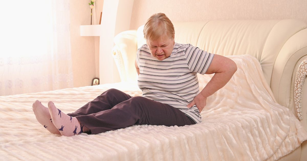 Ældre person i sengen